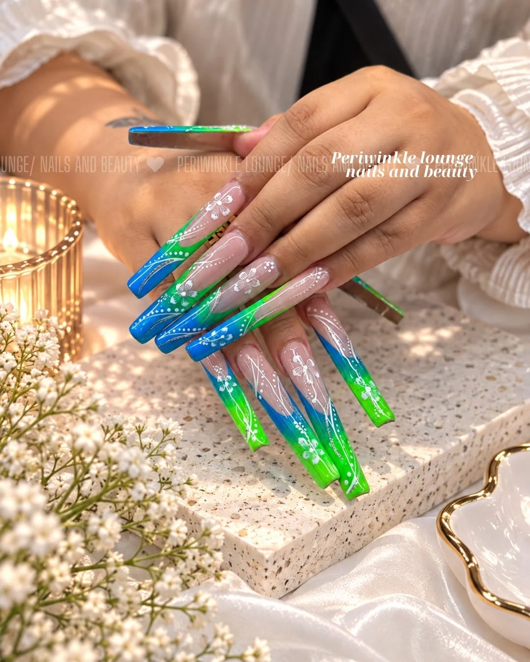 Electric Florals nail art at Periwinkle Lounge
