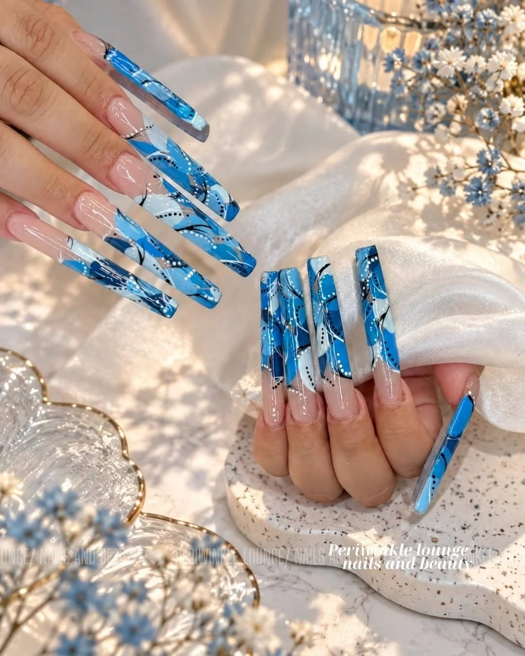 Blue Abstract nail art at Periwinkle Lounge