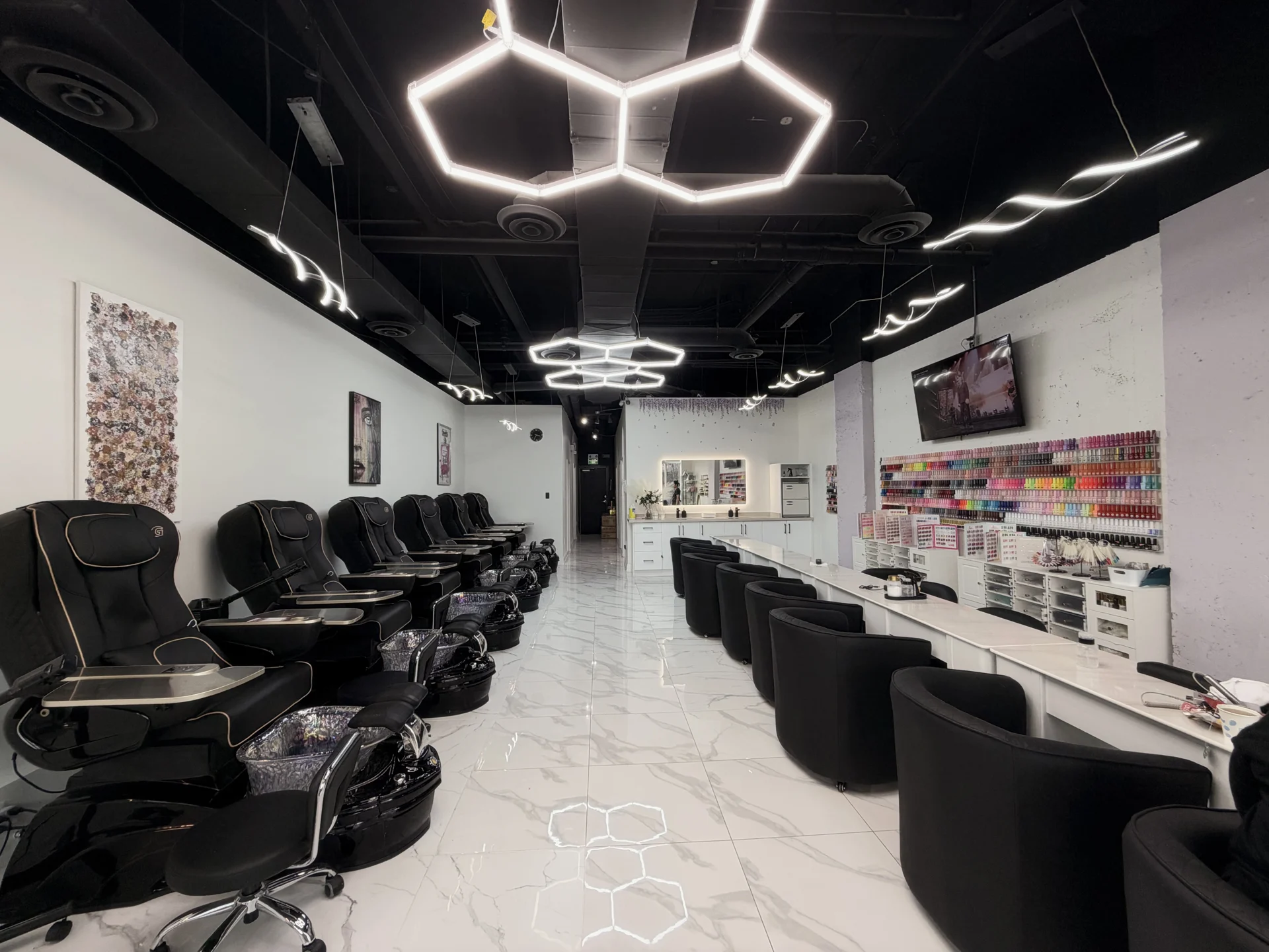 Full view of Periwinkle Lounge, with manicure tables and pedicure chairs