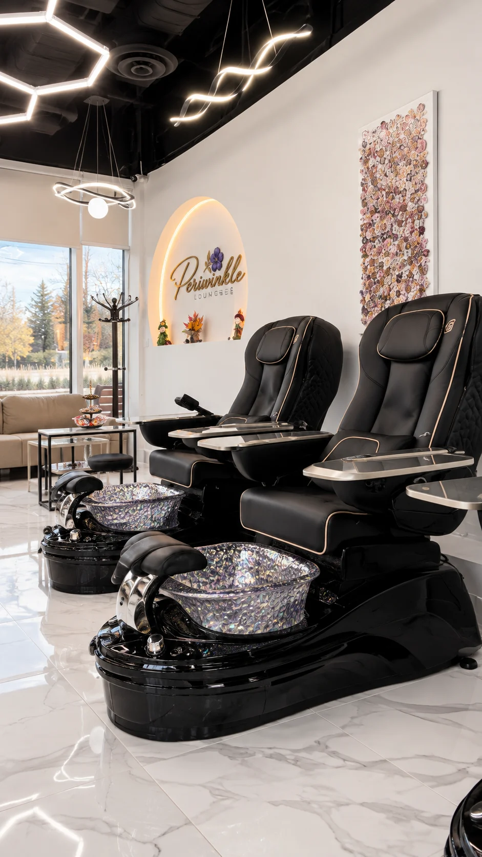 Comfortable pedicure chairs and glass foot baths at Periwinkle Lounge